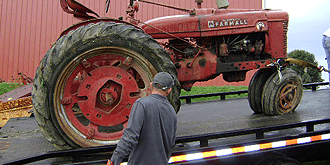 Tractor on a flatbed.